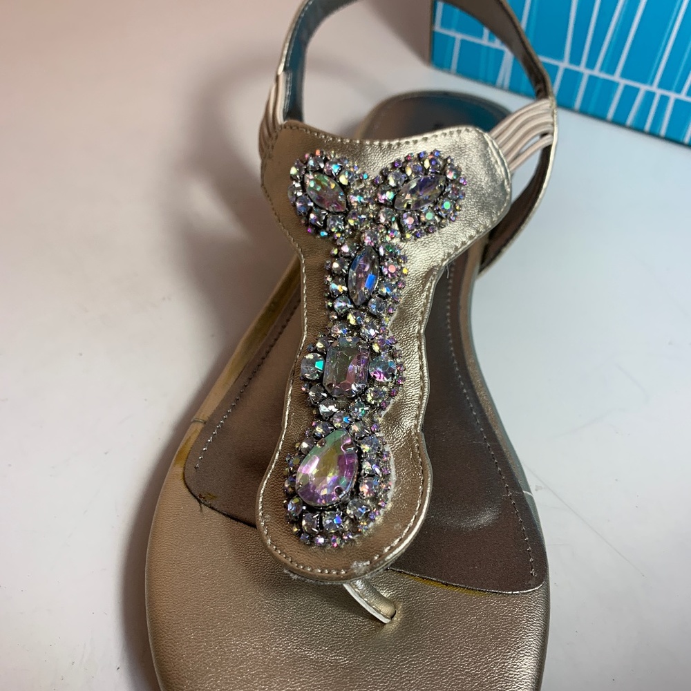 Women’s sandals size 7.5 , Gold color with jewelry details.